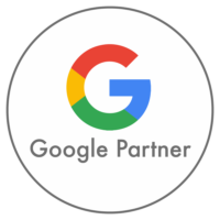 Google Partner logo featuring the letter "G" in red, yellow, green, and blue, with the words "Google Partner" below, encircled by a thin gray line.