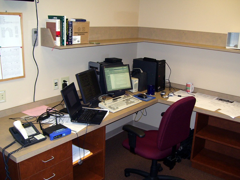 Business office desk representing connected software systems used in CRM integration